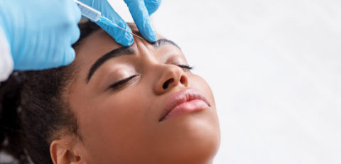 Plastic,Surgery.,Young,African,Woman,Receiving,Botox,Injection,In,Interbrow